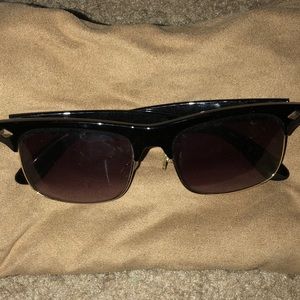 Black rimmed sunglasses